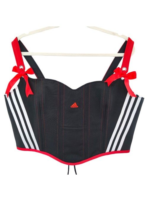 I reworked an Adidas sports top into a corset. I drafted the pattern myself  and i'm quite please with how it turned out. I've wanted to upcycle this  material for a while